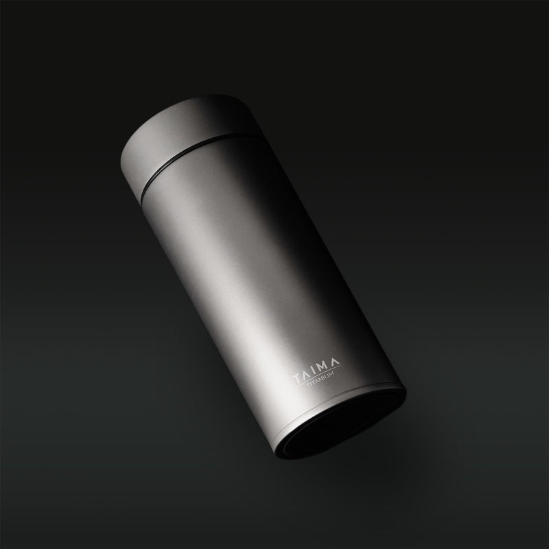 Titanium thermos bottle