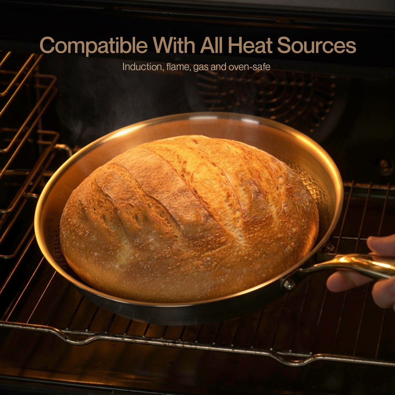 Baked loaf of bread in a pan inside an oven with text 'Compatible With All Heat Sources'.